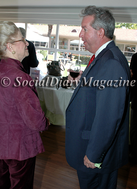 Judy White speaking with Ed Mracek